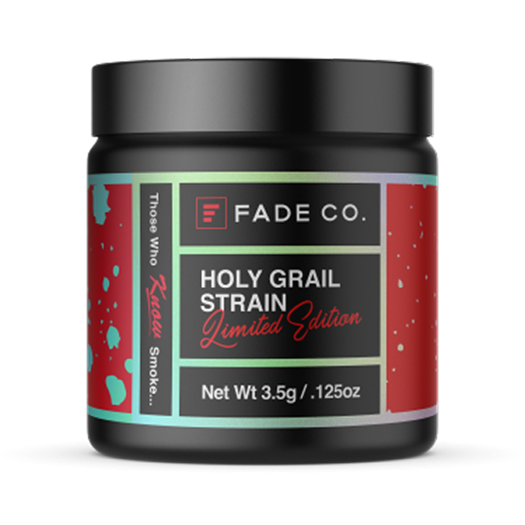 Holy Grail strain by Fade Co, showcasing vibrant green buds with orange hairs and a frosty appearance.