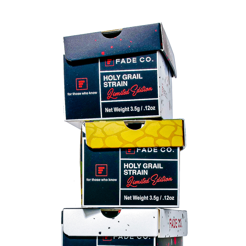 A stack of three boxes displaying the repeated letters "f" in a continuous pattern across the surfaces.